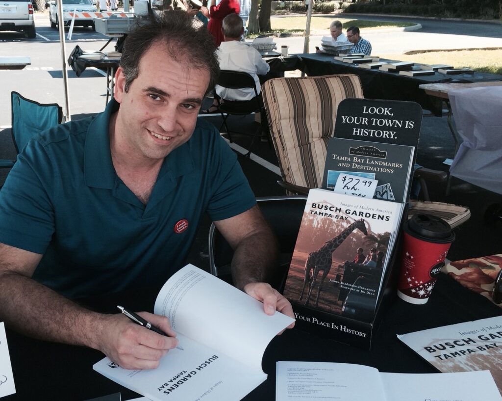 Here I am signing books at an author event. As much as I love being a writer and editor, I also really enjoy spending time in my garden. 