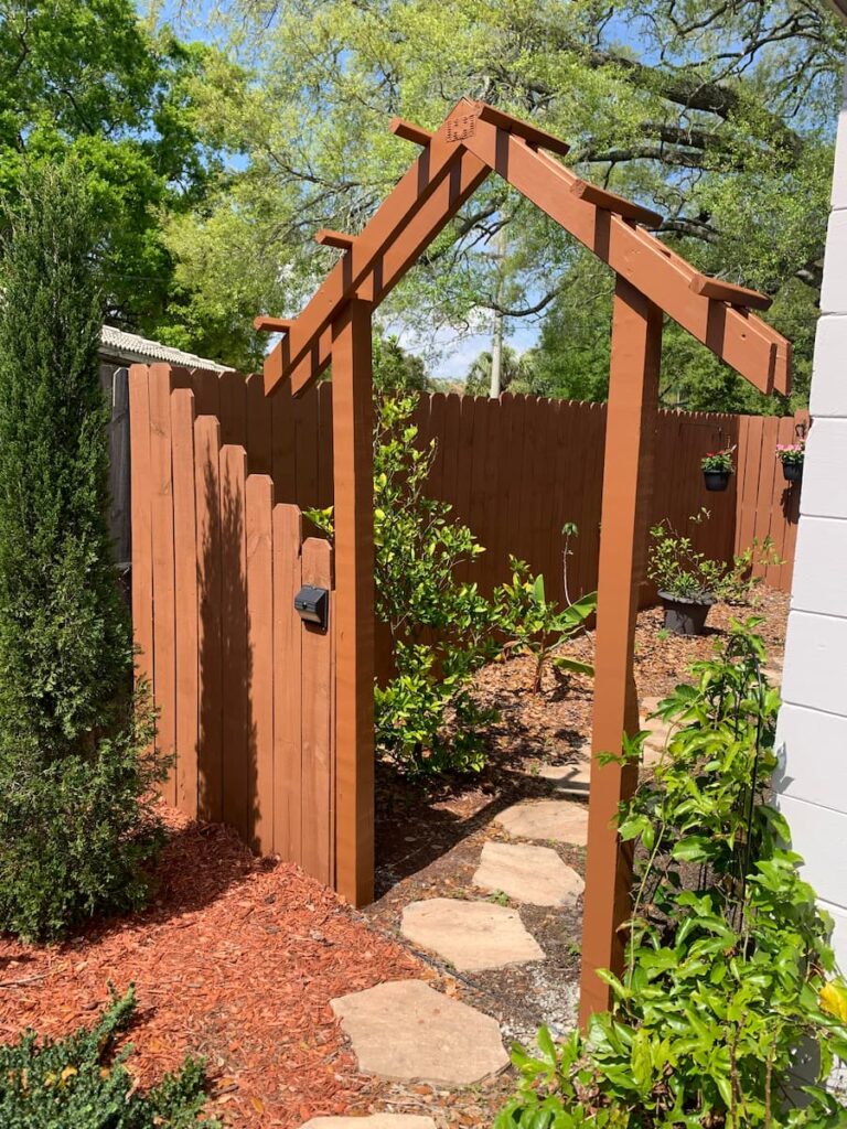 We turned our yard into a garden and added an arbor as a focal point.