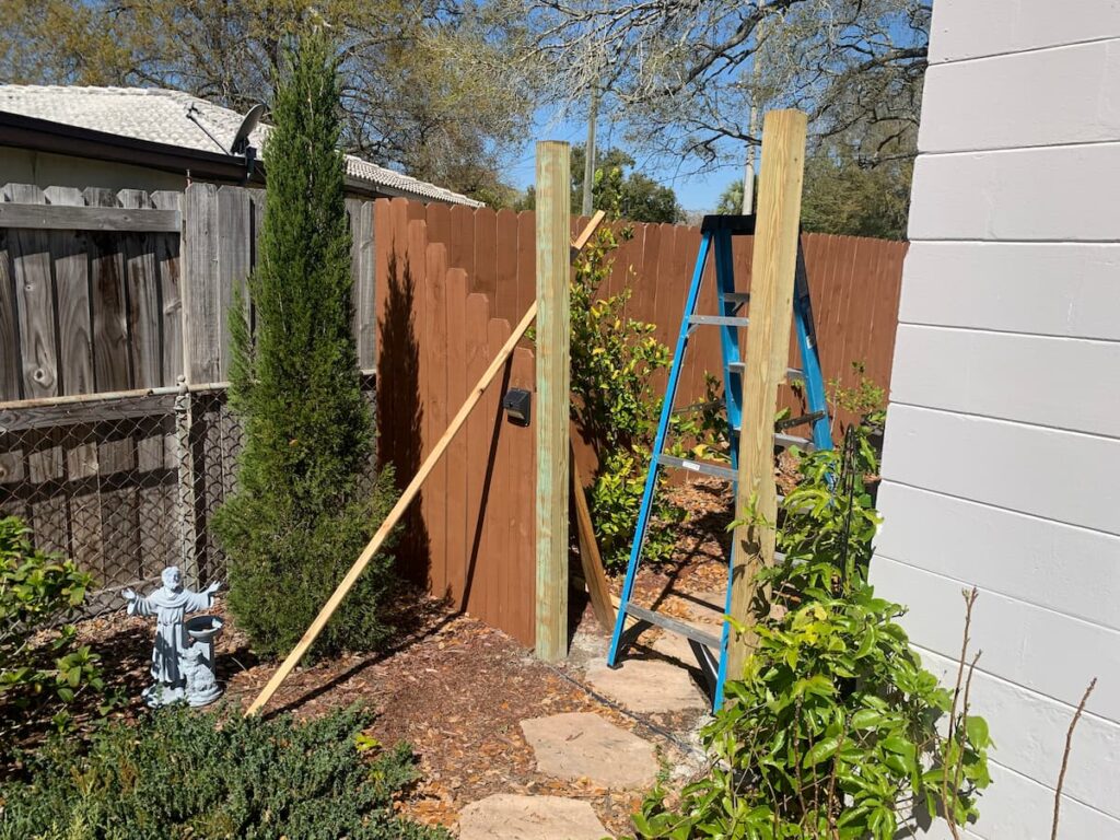 We poured concrete around the bases of the arbor posts for added durability. 