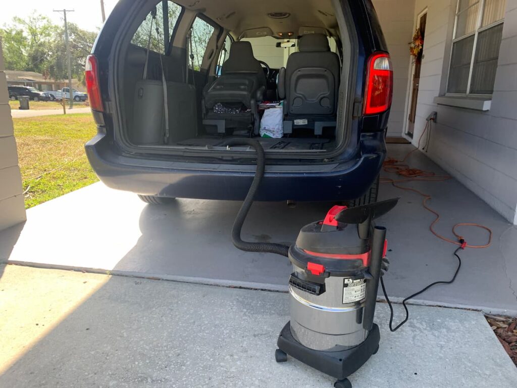 After removing the tarp, I vacuumed the van out with a shop vac to remove any remaining leaves, little stems, or dirt. Voila!